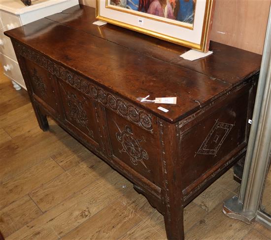 An 18th century oak coffer W.143cm